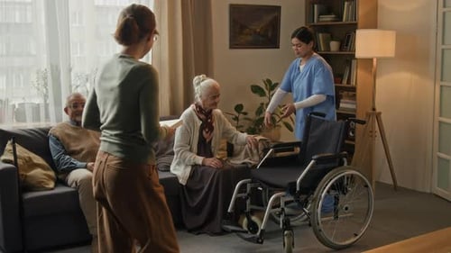 Elderly Couple with Home Care Nurse Assistant