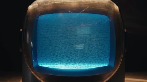 Vintage Television with Static on Blue Screen