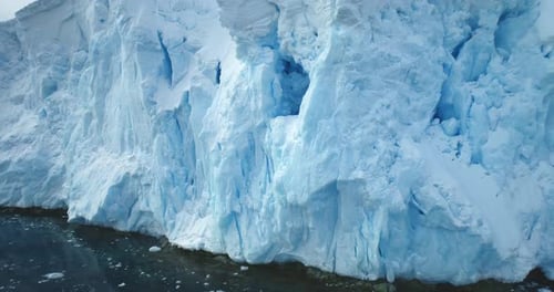 Antarctic Blue Ice Glacier Towering Polar Ocean