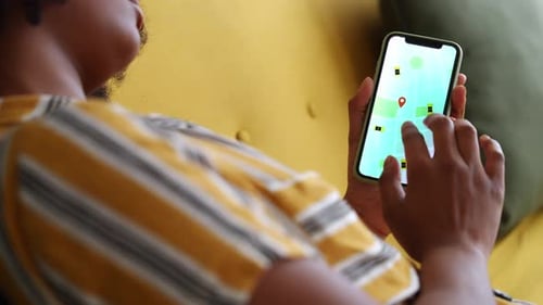 Person Uses Map Application on Mobile Phone