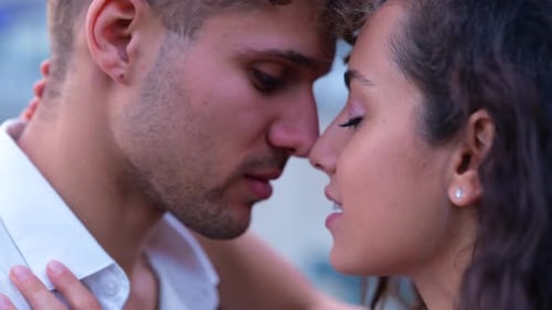 Close Up of Attractive Caucasian Woman and Man Expressing Love