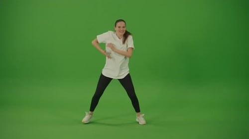 Professional Female Dancer Performing a Dance on a Green Screen Chroma Key