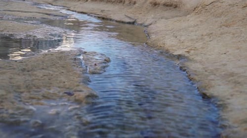 Running ocean stream in Malta.