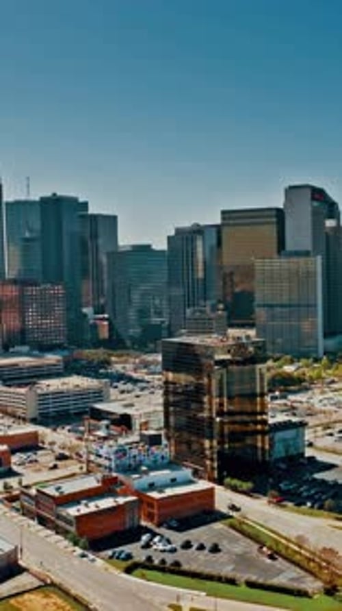 Aerial view of Dallas skyline showcasing urban development at midday