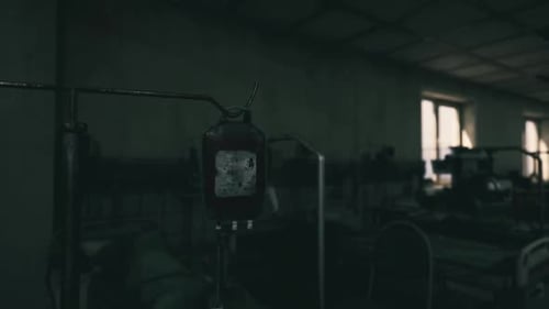 Abandoned Medical Room with Old Equipment and Dim Lighting in Hospital