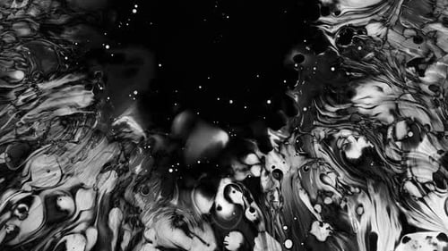 Abstract Ink Drop Creating Swirling Patterns