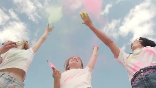 People Toss Holi Powder Paint at Sky