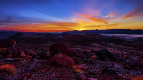 Vibrant Sunset Over Rocky Mountain Landscape