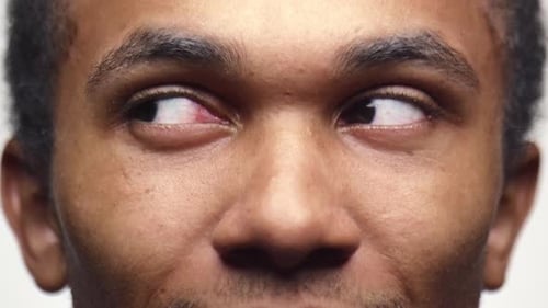 CloseUp of a Man Eyes Looking Sideways