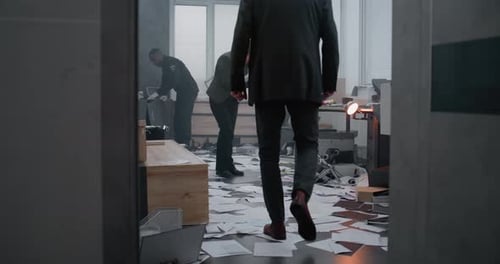 Detectives Investigate Crime Scene in Messy Office