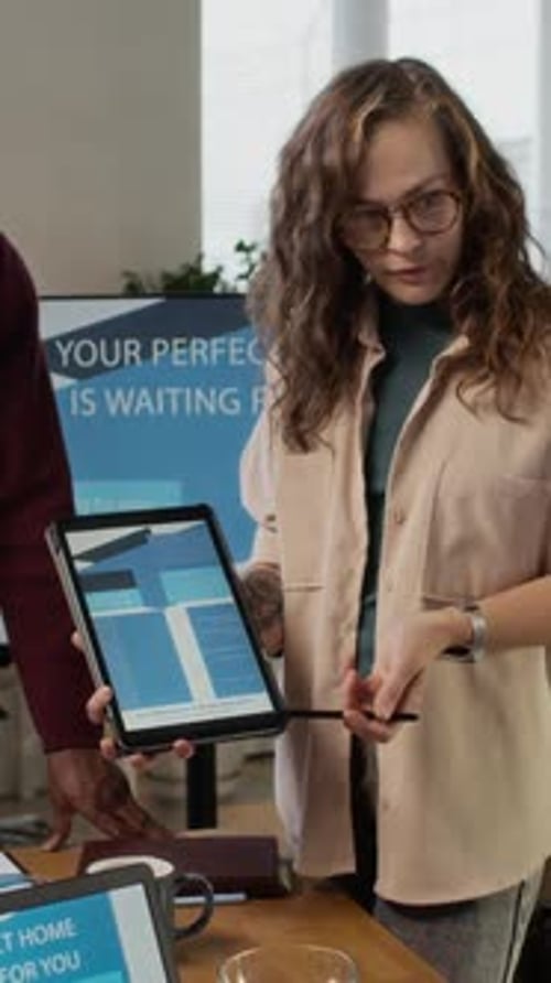 Diverse Group of Designers Collaborating During Creative Meeting in Bureau