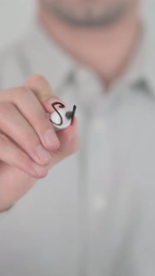Man Writing Stop Crime on Glass Surface, Close-up