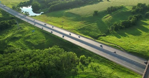 Aerial View of Traffic on the Highway During Sunset