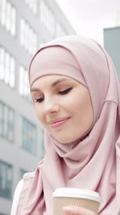 Vertical Screen Portrait of a Young Muslim Girl in Hijab Arabian Business Woman