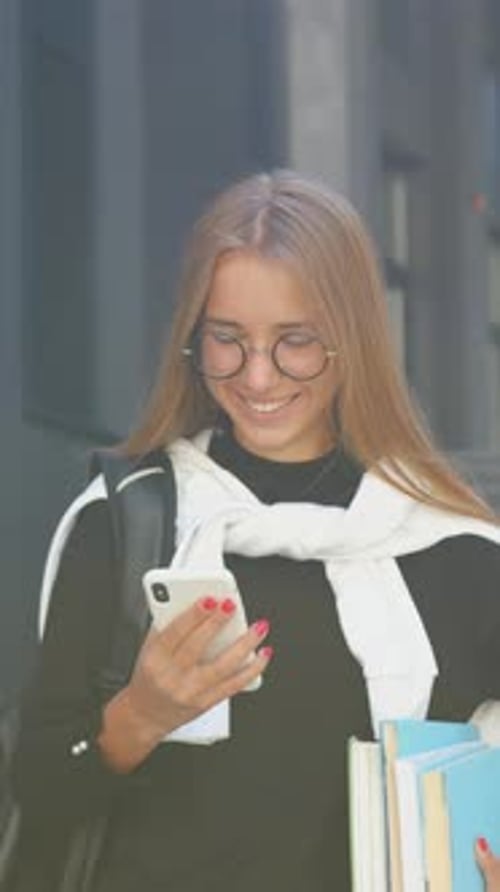 Likable Joyful Carefree 25Aged Trendy Girl with Long Straight Hair Standing Near Office Building and