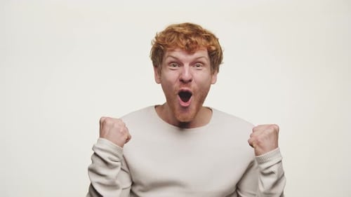 Man Cheering with Excitement and Enthusiasm