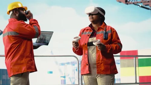 Female Worker Uses VR at Industrial Construction Site