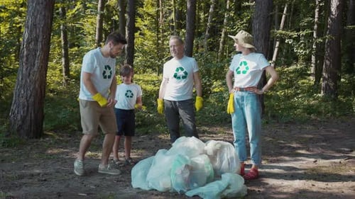 A Group Confronts Littering in a Forest Urging Environmental Action