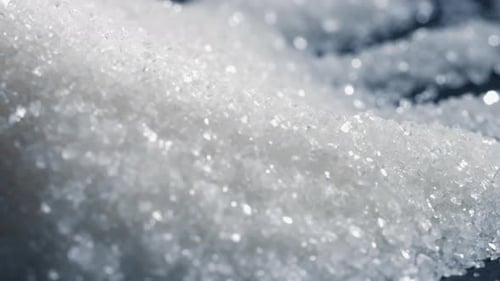 Closeup on Blackandblue Background Lies on White Crumbly Granulated Sugar Crystals on Top Pour on a