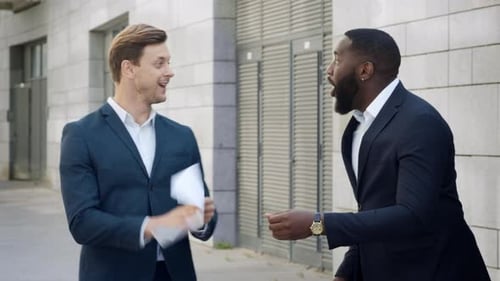 Excited Businessmen Reading Good News on Business Papers at Street. Happy Business