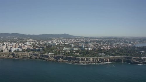 Amazing blue ocean very calm with city behind
