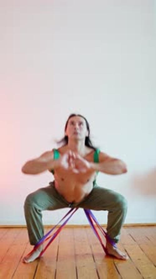 Engaging in Dynamic Balance Exercise Using Resistance Bands in a Studio Setting Environment