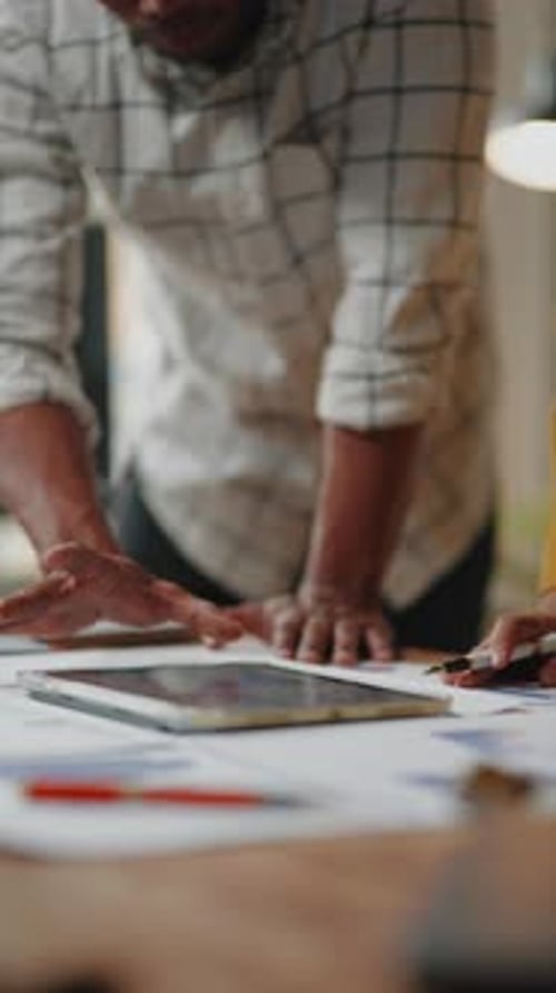 Vertical footage of Close up of hand teamwork business group are meeting working and brainstorming