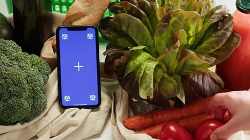 Food Shopping Delivery Online Shop Application Smartphone with Blue Chroma Key Screen and Fresh