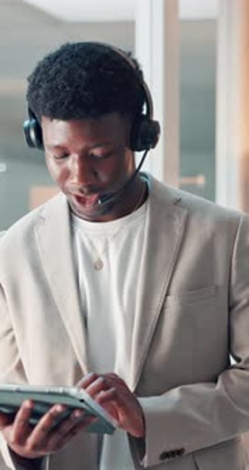 Headset, tablet and business African man in office for financial advice, investment deal or contact