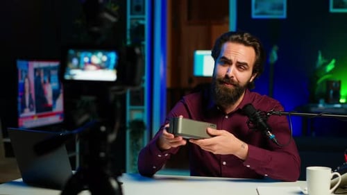 Man Reviews Technology on Podcast