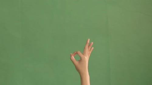 A Female Hand Doing A Flick Action In Various Ways On Green Screen