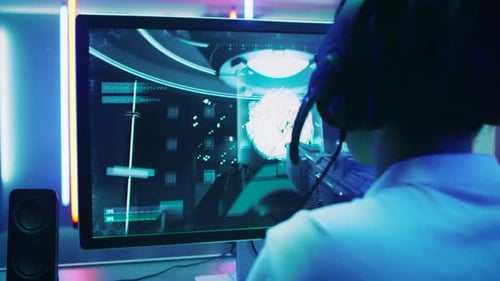Close-up Shot of Professional Gamer Playing in First-Person Shooter Online Video Game on His Person