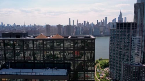 Aerial Shot High Rise Futuristic Buildings NYC New York Cityscape In Background