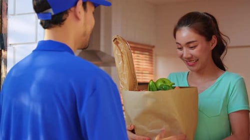 Grocery Delivery Man Delivers Fresh Food to Home
