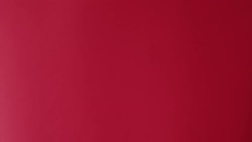 Hand With Glove Holds Christmas Gifts