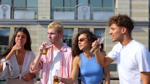 Close Up of Young Carefree Happy People Standing Outdoors on Sunny Day Having Fun at Party on the