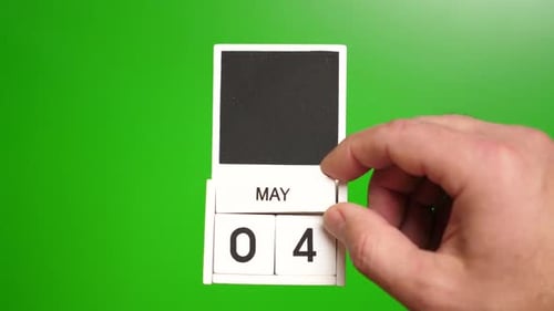 05. Calendar with the date May 4 on a green background. Illustration for an event of a certain date.