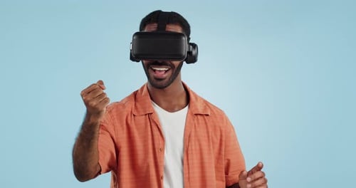 Gamer man, virtual reality and glasses in studio with hand, click and swipe in metaverse by blue