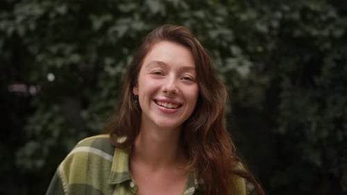 Happy Woman Smiling Outside in Nature