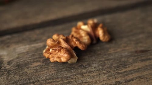 walnut kernel on a wooden table top