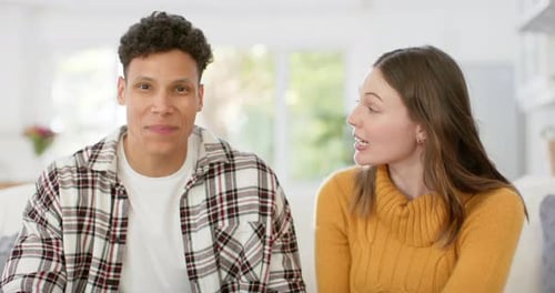Friendly Couple Chatting in Bright Home Interior