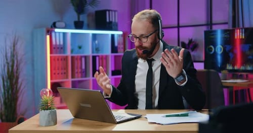 Man Talking During a Video Conference at Office