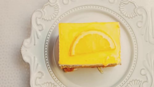 Waviness Effect of A Piece of Tangerine Cake with Jelly
