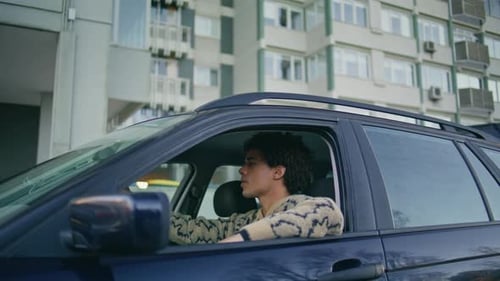 Latino Guy Sitting Automobile Looking on City Road Man Leaning Window Car