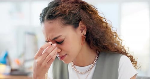 Headache, stress and young woman in the office with project mistake, crisis or problem