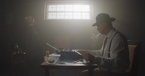 In This Mysterious Scene We Find a Typewriter Surrounded By a Cast of Suspenseful Characters