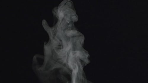 Abstract smoke floating on black background