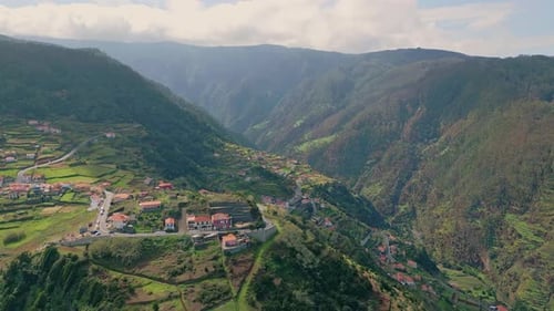 Small Town Surrounded Mountain Hills Drone View Village Nestled in Green Valley