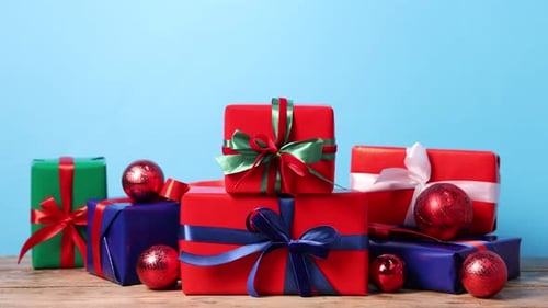 Colorful Gift Boxes with Ribbons and Christmas Ornaments