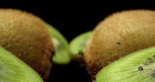 Fresh kiwi fruit cut in half super close up shoot fly over 4k high quallity shoot